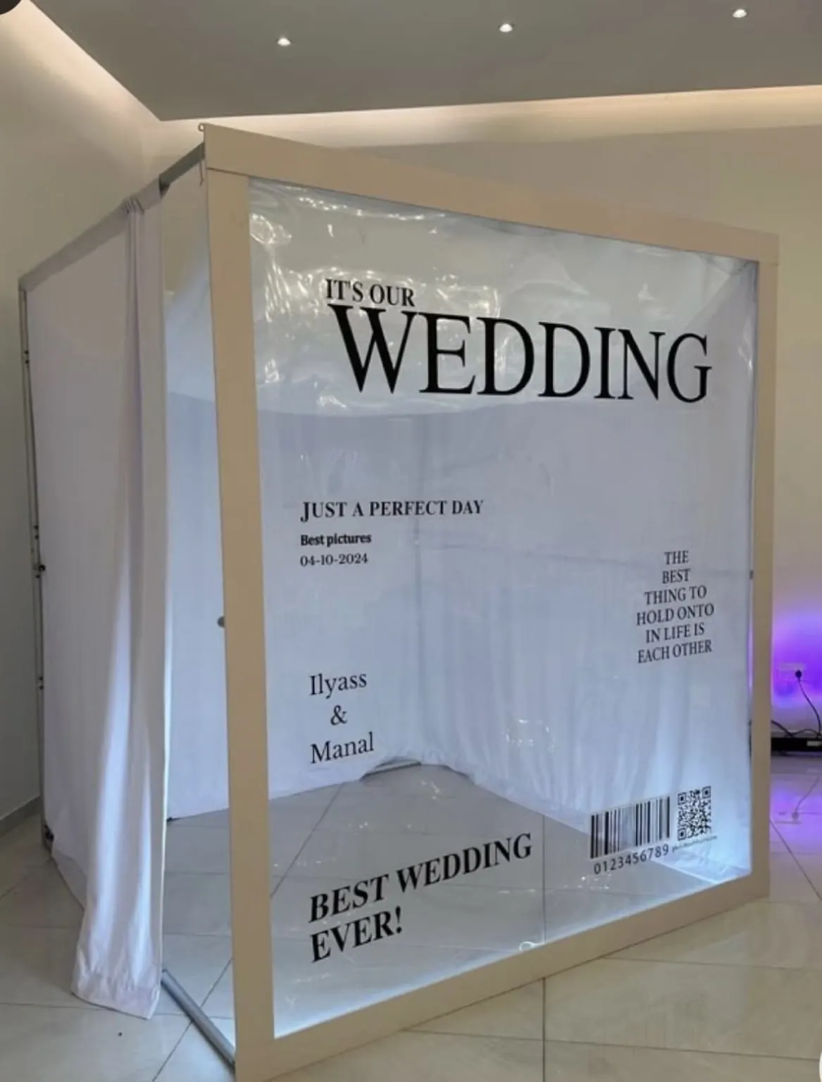 A printed Bits Events booth backdrop set up for a wedding